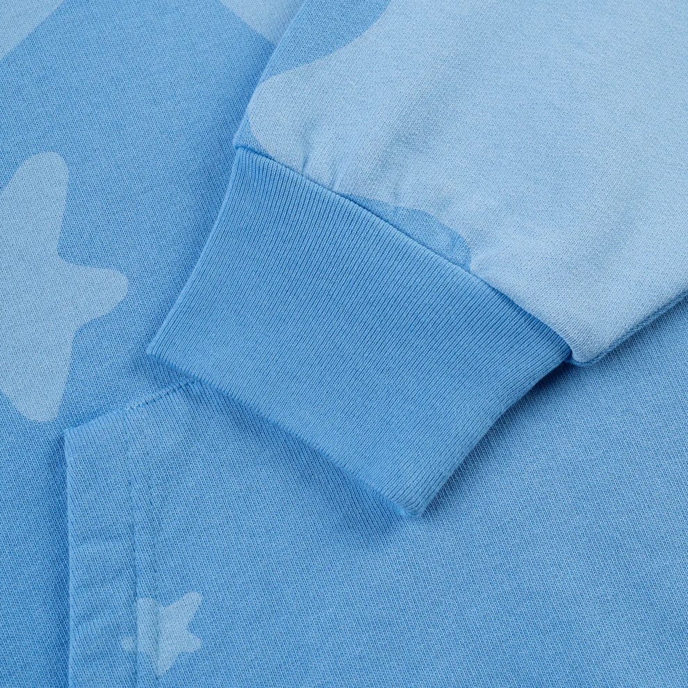 Close-up of the Sp5der Star Hoodie – Baby Blue 440GSM Heavyweight Oversized Streetwear Pullover, featuring ribbed cuffs and subtle star details—ideal for Y2K streetwear vibes.