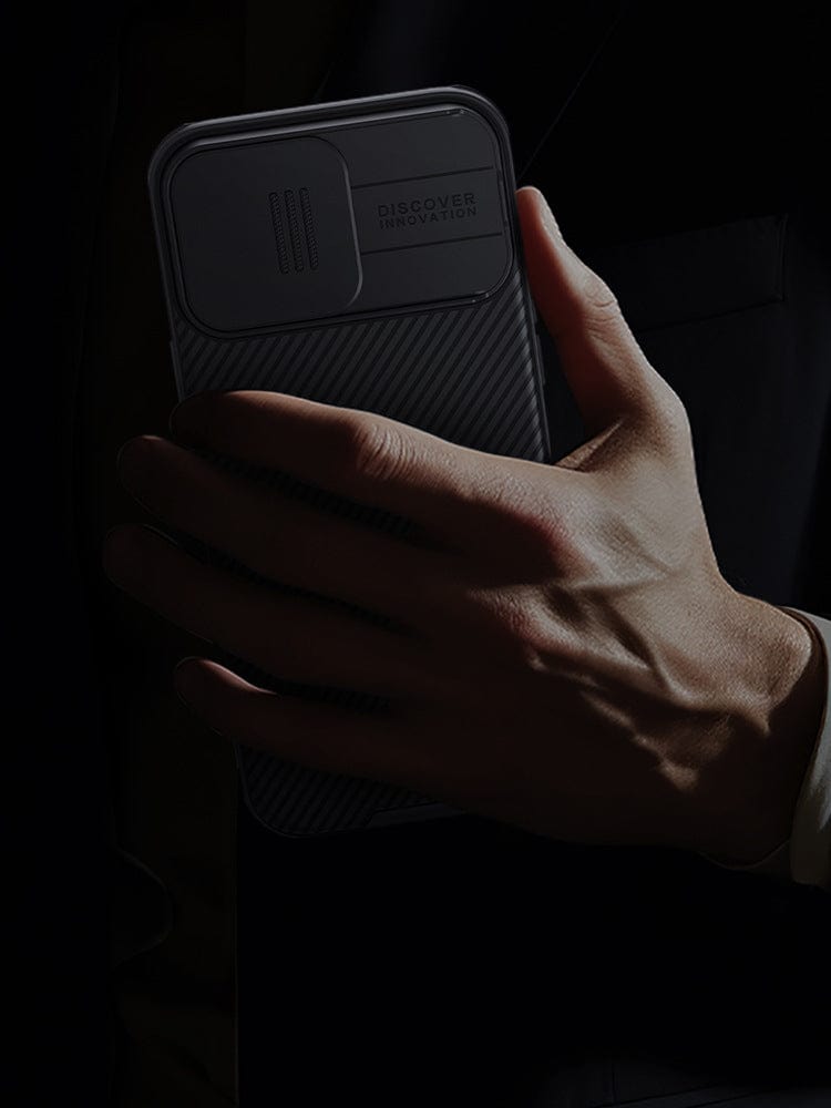 A hand holding a smartphone with the phrase "Discover Innovation" visible on its back, likely shielded by an iPhone 16 Pro Max Camera Slider Case offering Anti-Scratch and Shockproof Slim Fit Protection. The background is dark, adding a sense of mystery and focus to the message.