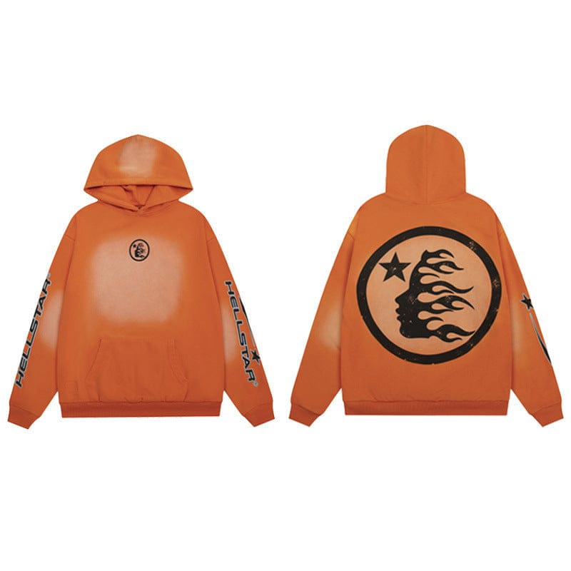 The Hellstar Washed Orange Flame Face Circle Logo Hoodie in orange is shown from front and back, featuring black flame and star graphics on the back, a small front circle logo, and "HELLSTAR" text along both sleeves.