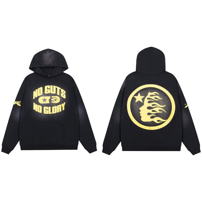 The Hellstar Washed Black 'No Guts No Glory' Flame Face Hoodie features bold yellow graphics and symbols on the front, a star-and-flame emblem on the back, and distinctive yellow sleeve details—a must-have piece for streetwear fans.