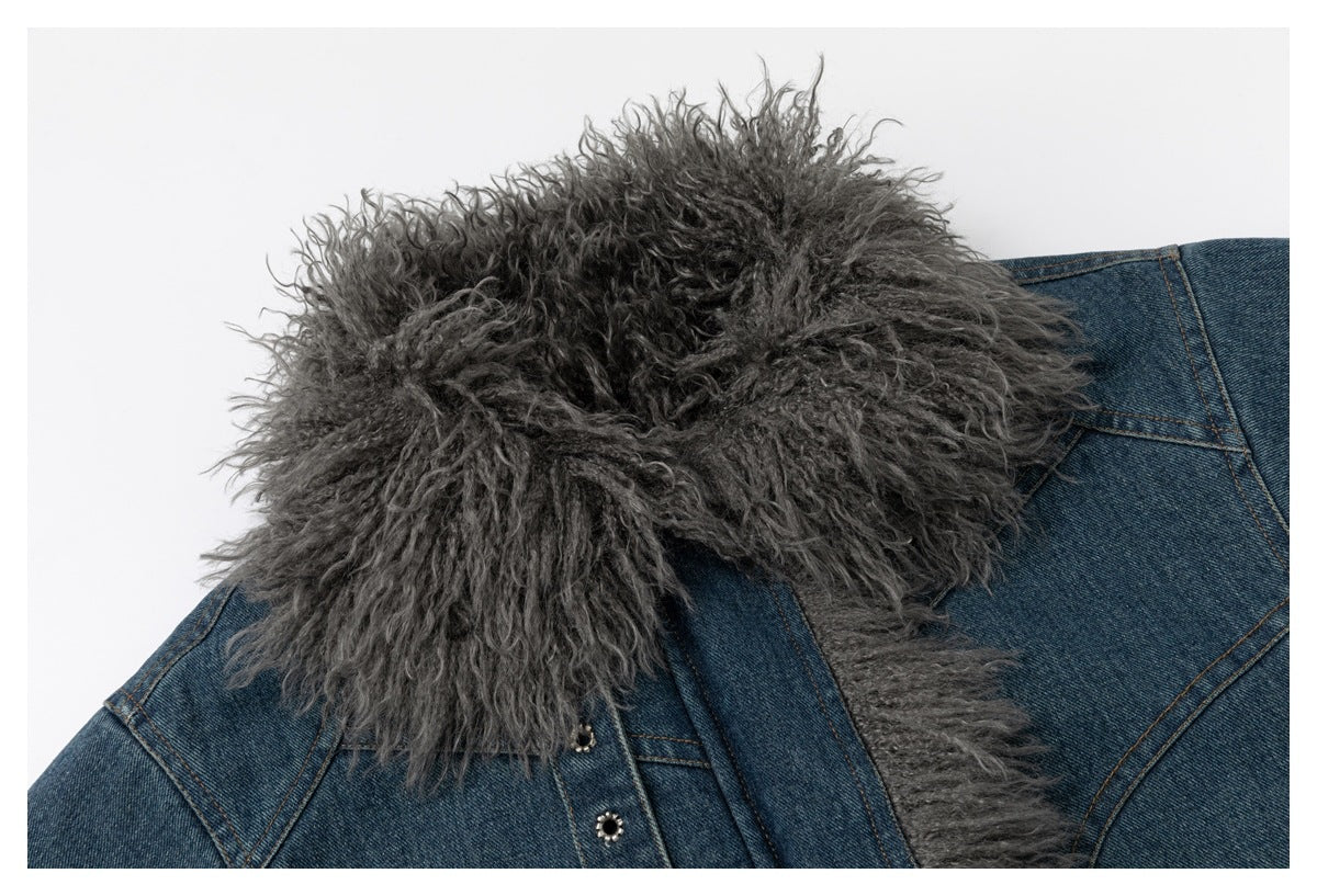 Close-up of the jacket's voluminous gray shaggy collar against blue denim.