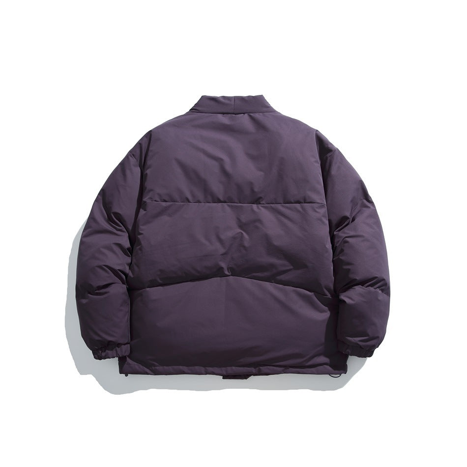 Back view of a dark purple padded jacket with broad horizontal panels and elastic cuffs.
