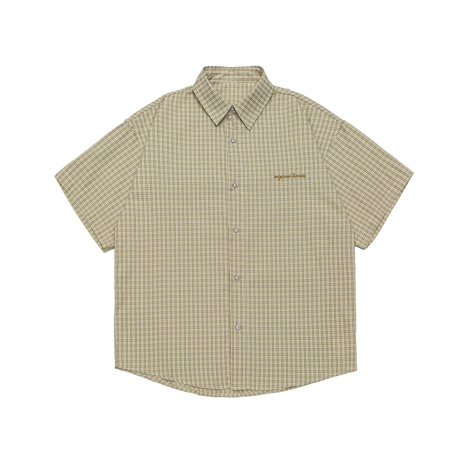 Beige-yellow small-plaid short-sleeve button-up shirt with collar and brown chest embroidery, front flat view