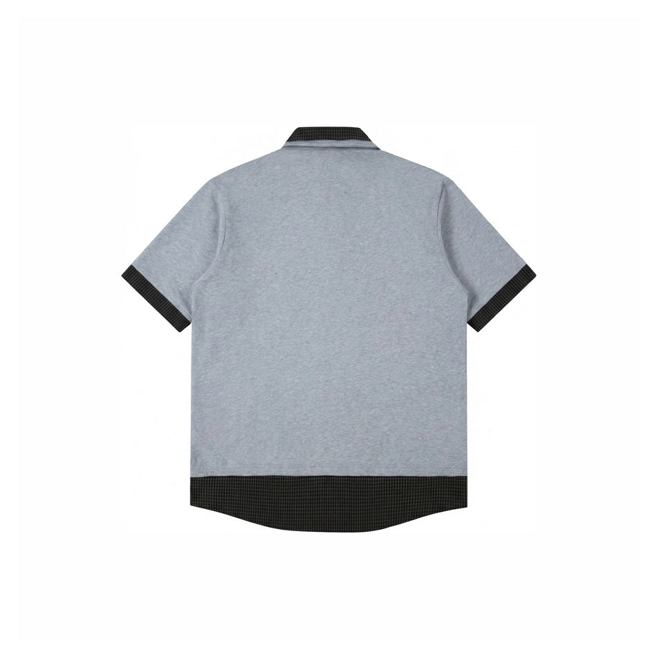 Back view of a heather-gray short-sleeve polo with black fine-check collar, cuffs, and hem trim.