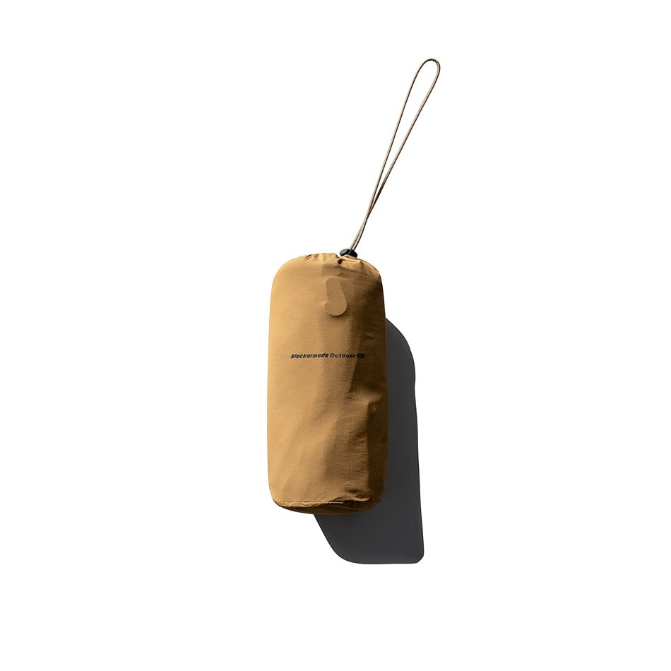 Golden brown drawstring storage pouch with a long cord loop, shown against white.