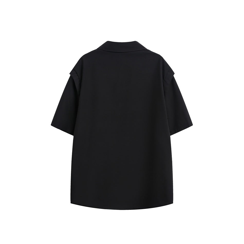 Back view of a plain black short-sleeve shirt with a wide collar, laid flat on a white background.