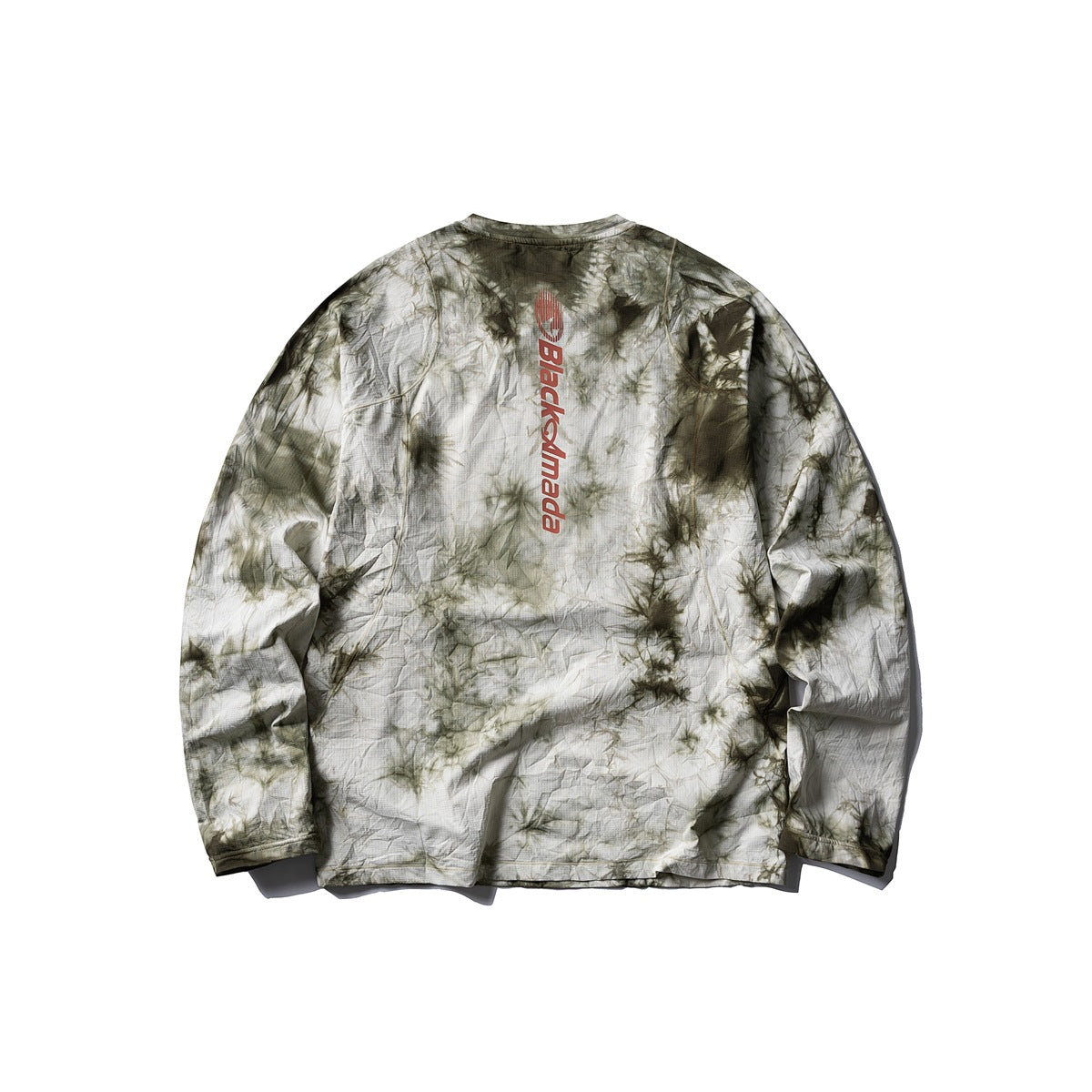 Back view of an olive and cream tie-dye long-sleeve shirt with vertical red lettering printed on the upper back.