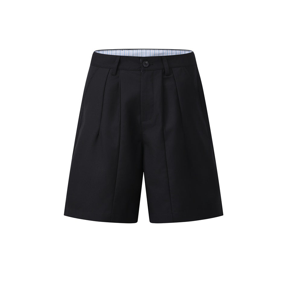 Black pleated knee-length shorts flat front view with button waistband and striped inner waistband