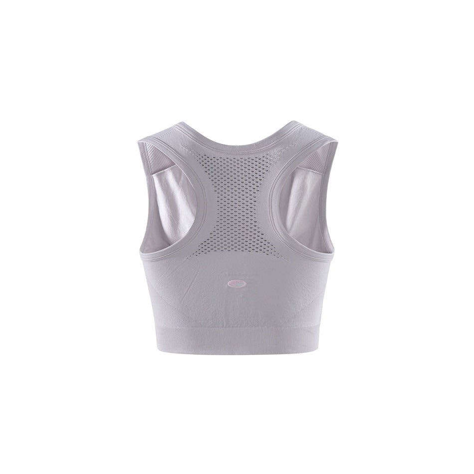 Back view of a pale lavender cropped athletic top with a racerback and perforated mesh panel.