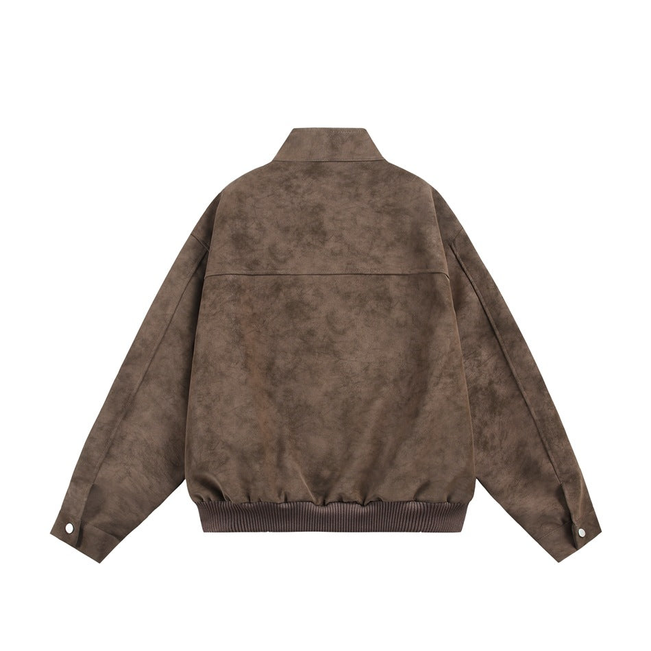 Back view of brown stand-collar jacket with yoke seam, ribbed hem and snap-button cuff tabs