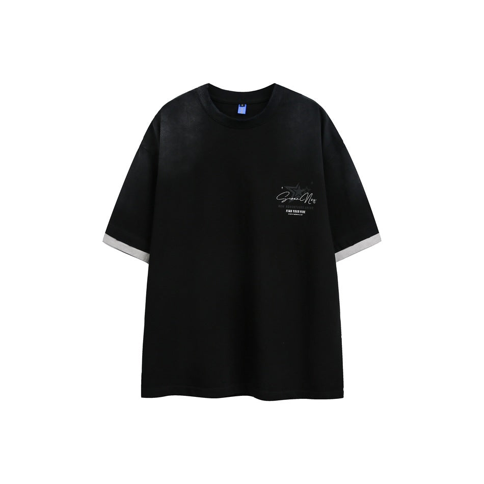 Black short-sleeve crew-neck T-shirt with faded wash, left chest print and light gray layered sleeve hems, flat front view