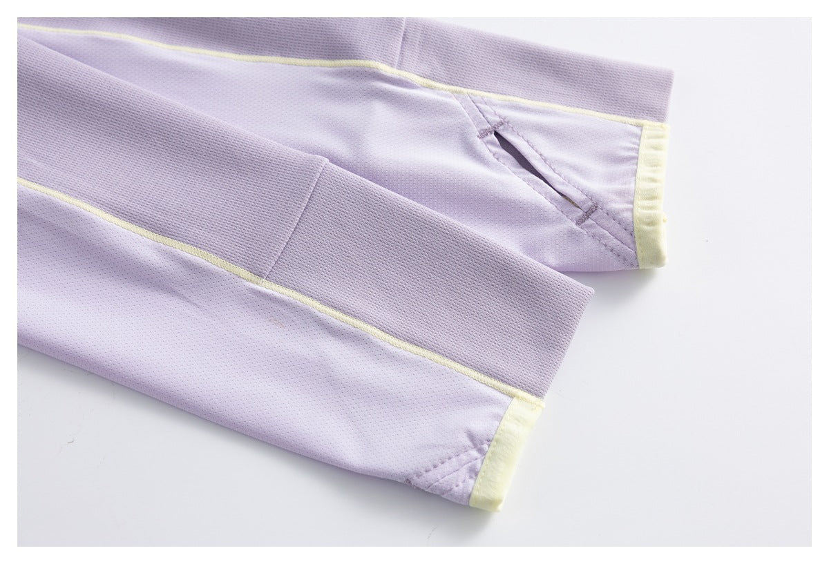Close-up of two lavender sleeves with mesh panels, pale yellow piping and contrasting cuff edges.