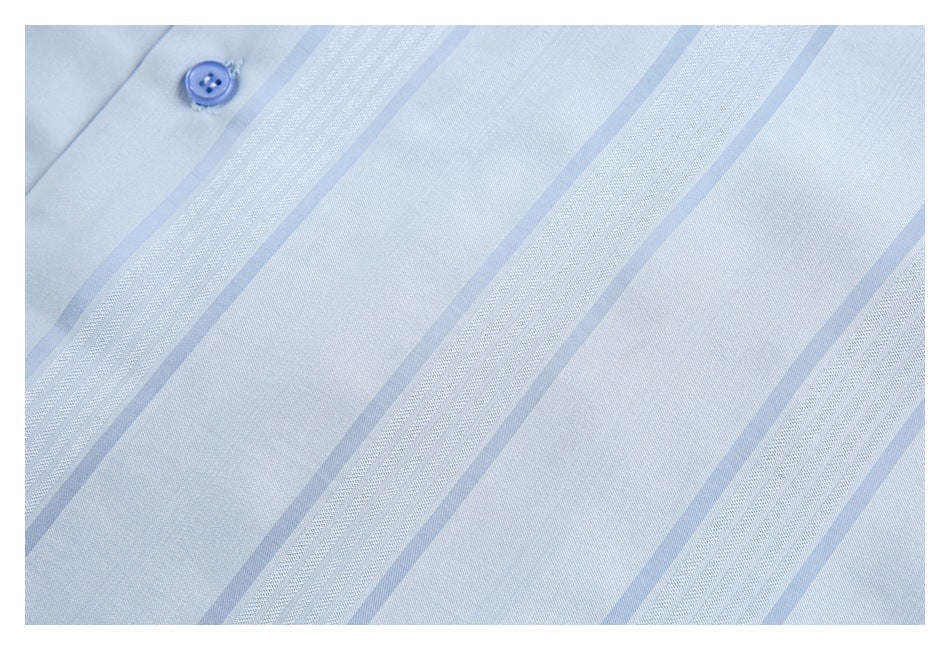 Close-up of the shirt's light blue fabric, narrow stripes, and one blue button.