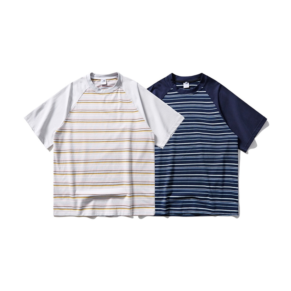 Two short-sleeve raglan T-shirts: light gray with multicolor stripes and navy with thin blue and white stripes.