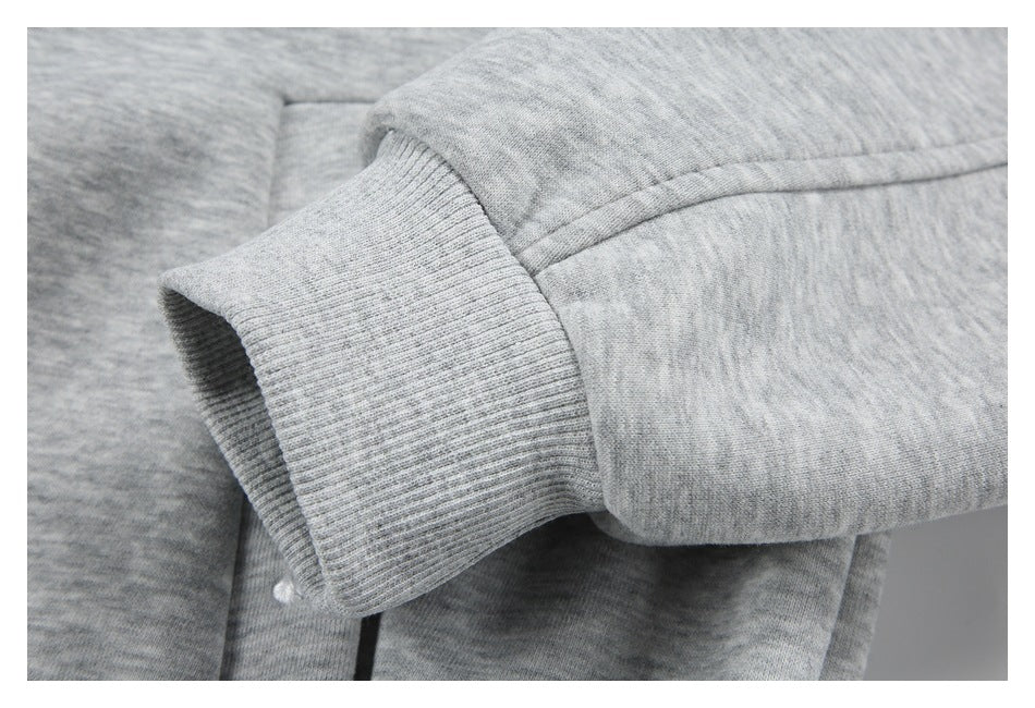 Close-up of the hoodie’s ribbed sleeve cuff and stitched sleeve seam.