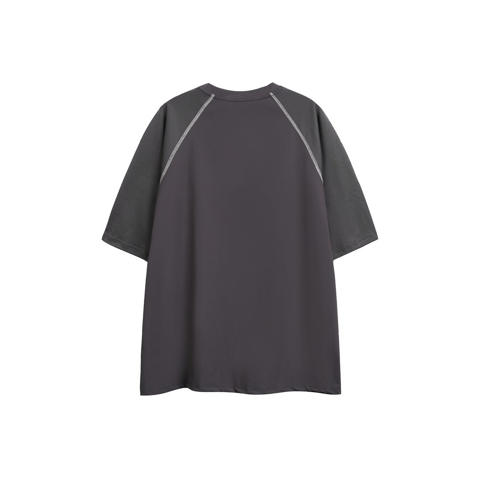Back view of dark purple-gray raglan T-shirt with lighter gray sleeves and contrast seam stitching