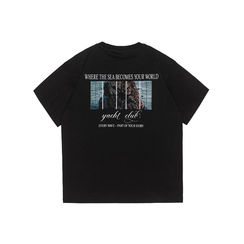 Black short-sleeve crew-neck t-shirt back with sea and rock graphic print and white text