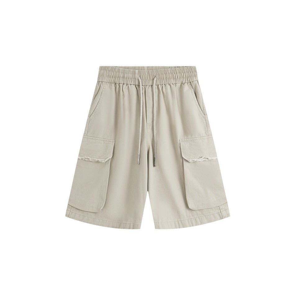 Beige khaki cargo shorts with elastic drawstring waist and frayed-edge cargo pockets, front view