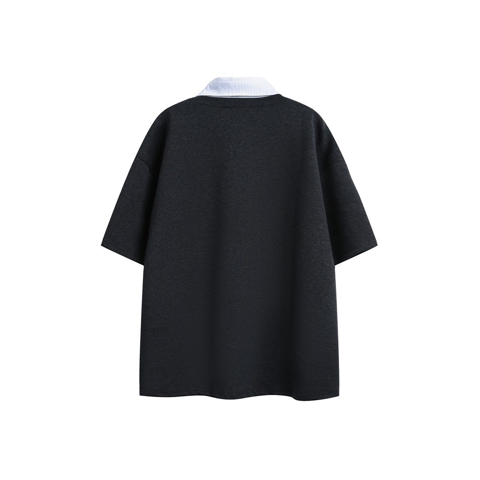Back view of a charcoal heather oversized short-sleeve top with a white pinstriped collar.