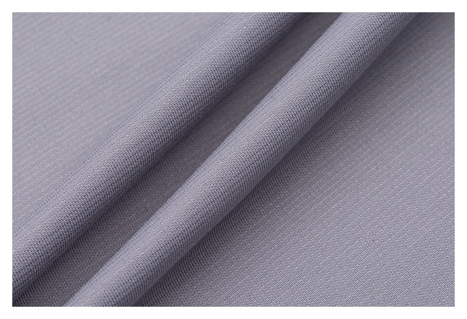 Close-up showing the fine textured surface and drape of lavender-gray fabric.