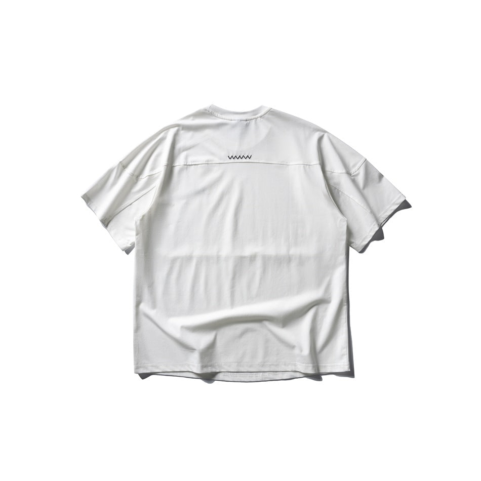 Back view of white short-sleeve T-shirt flat lay with small zigzag embroidery below the collar