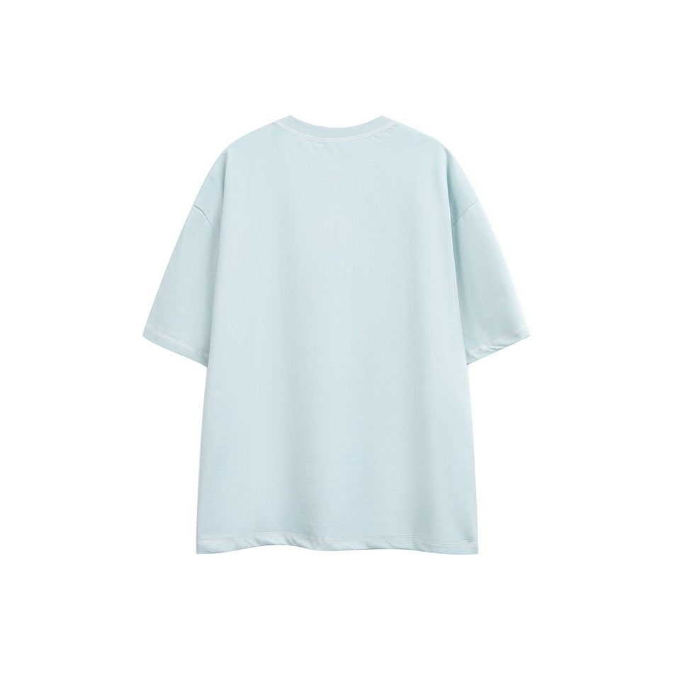 Back view of a pale blue oversized T-shirt with matching light stitching.