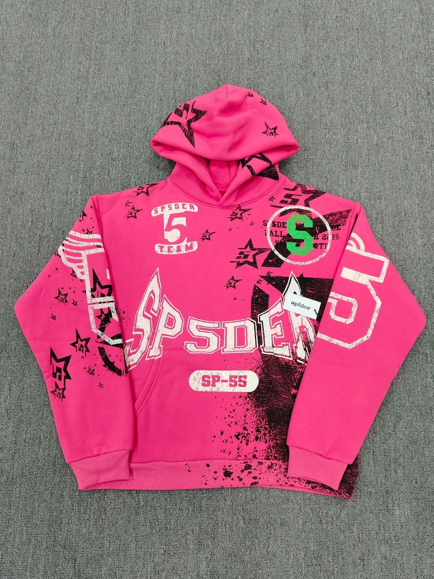 Sp5der SP-55 Team pink pullover hoodie with all-over graphic star prints and varsity lettering in pink, black, and white