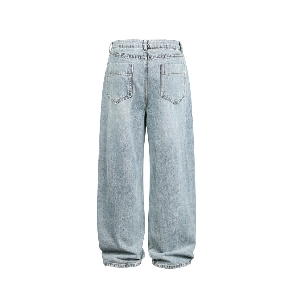 Back view of light-wash, wide-leg jeans with two rear pockets and a high waistband.