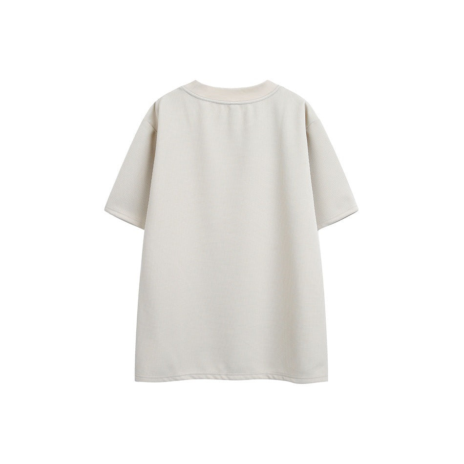 Plain off-white short-sleeve T-shirt shown from the back against a white background.