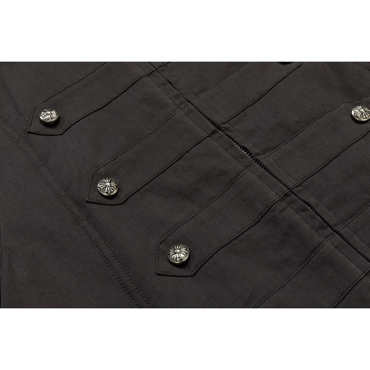 Close-up of the parka's dark fabric, stitched panels and ornate metal buttons.