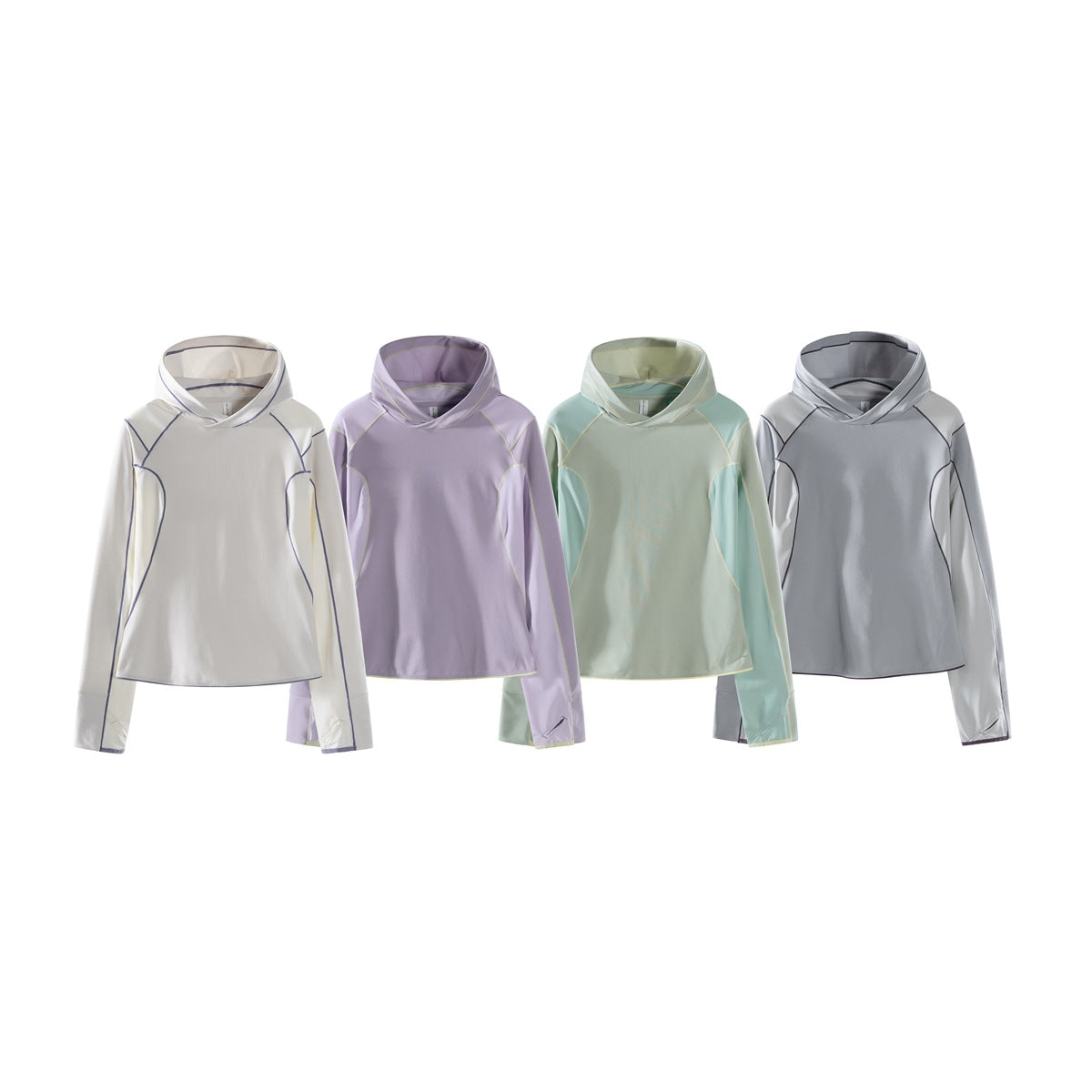 Four hooded athletic tops shown together in white, lavender, pale mint, and gray, each with contrasting seam piping.