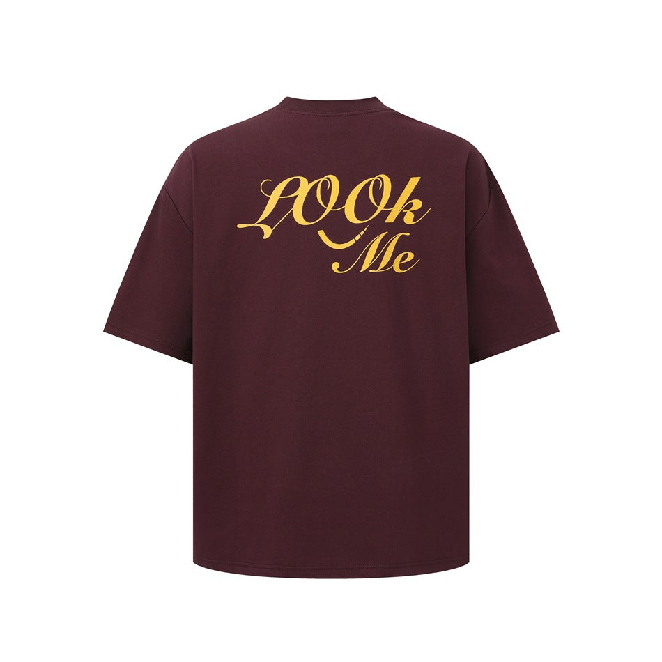 Burgundy short-sleeve T-shirt back with large yellow script LOOk Me print