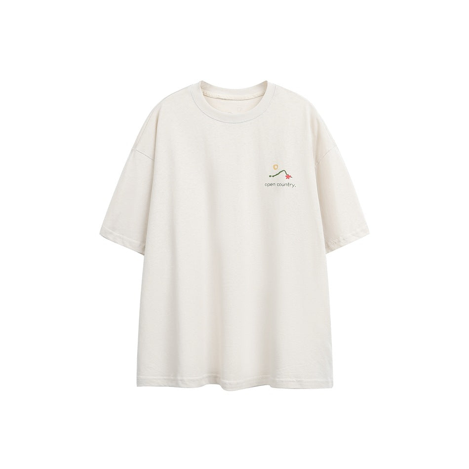 Beige apricot short-sleeve crewneck t-shirt, flat front view with small open country mountain print on left chest