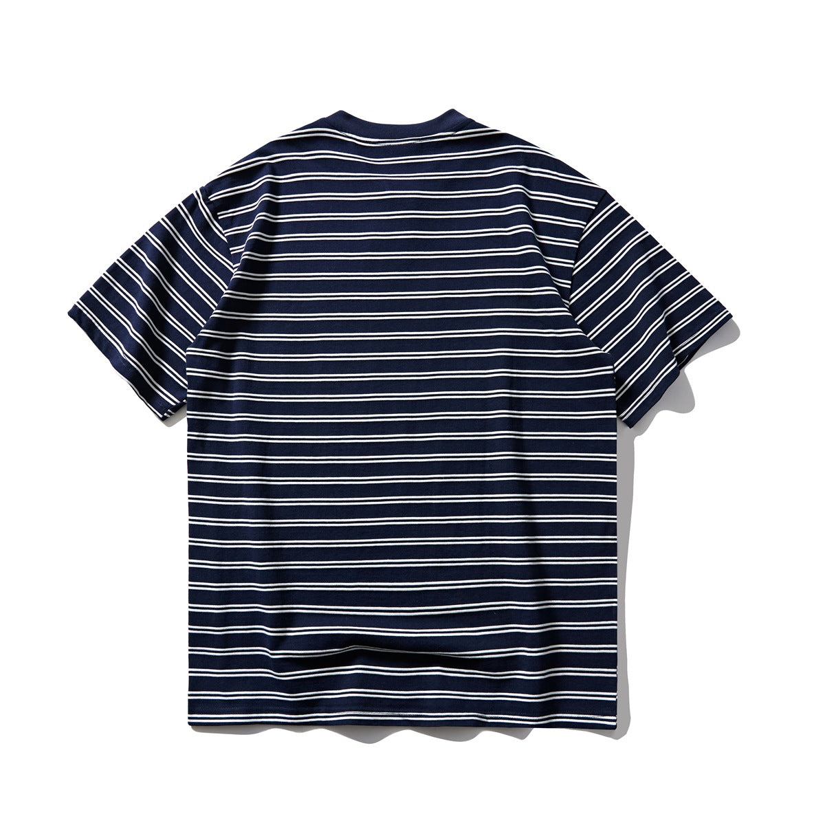 Back view of a navy short-sleeve T-shirt with thin ivory horizontal stripes.