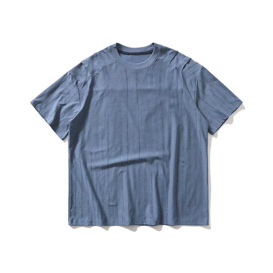 Blue short-sleeve crew-neck T-shirt, front flat lay, with textured vertical stripes and shoulder panel seams