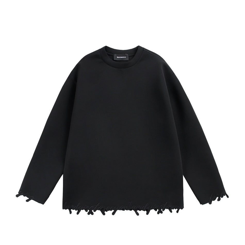 Black crew-neck sweatshirt, front flat lay, with frayed embroidered loop trim at hem and cuffs