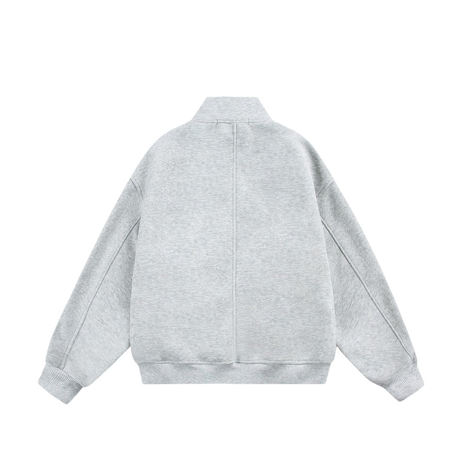 Back view of a light gray stand-collar jacket with long sleeves, ribbed cuffs, and a ribbed hem.