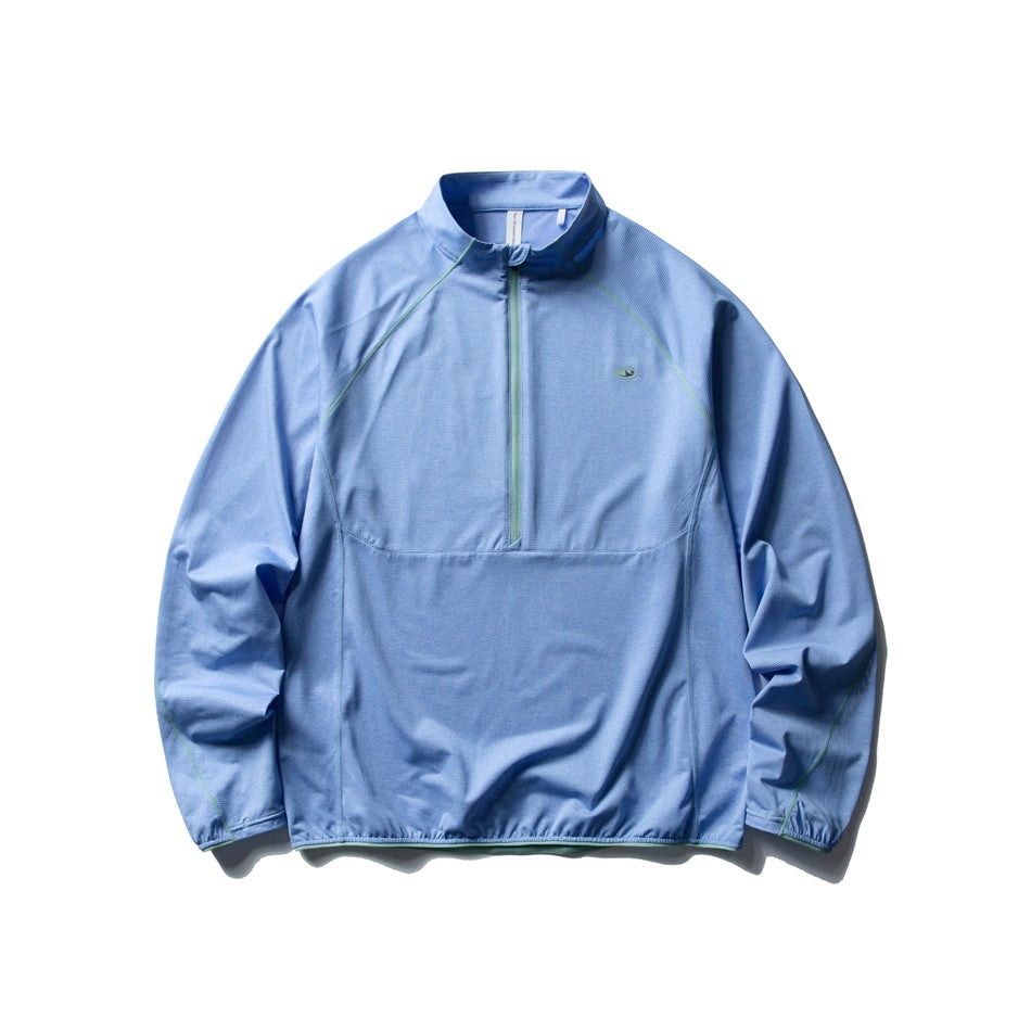 Sky blue half-zip stand-collar pullover with light green zipper and piping, flat lay front view