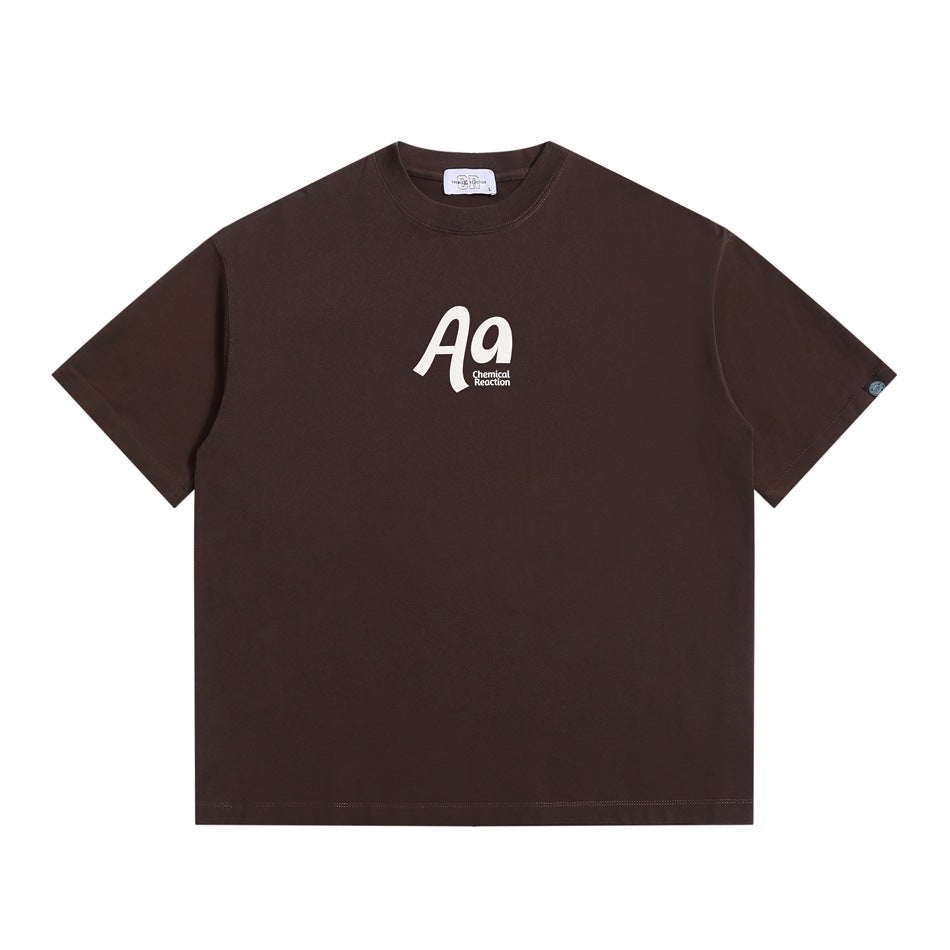 Brown short-sleeve crew-neck T-shirt with cream 'Aa Chemical Reaction' chest graphic, flat front view