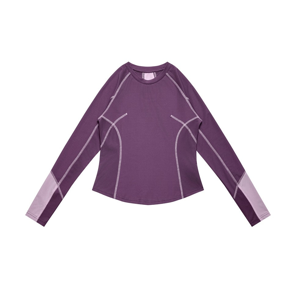 Purple long-sleeve crew-neck top flat lay with light lilac contrast stitching and lilac lower-sleeve panels