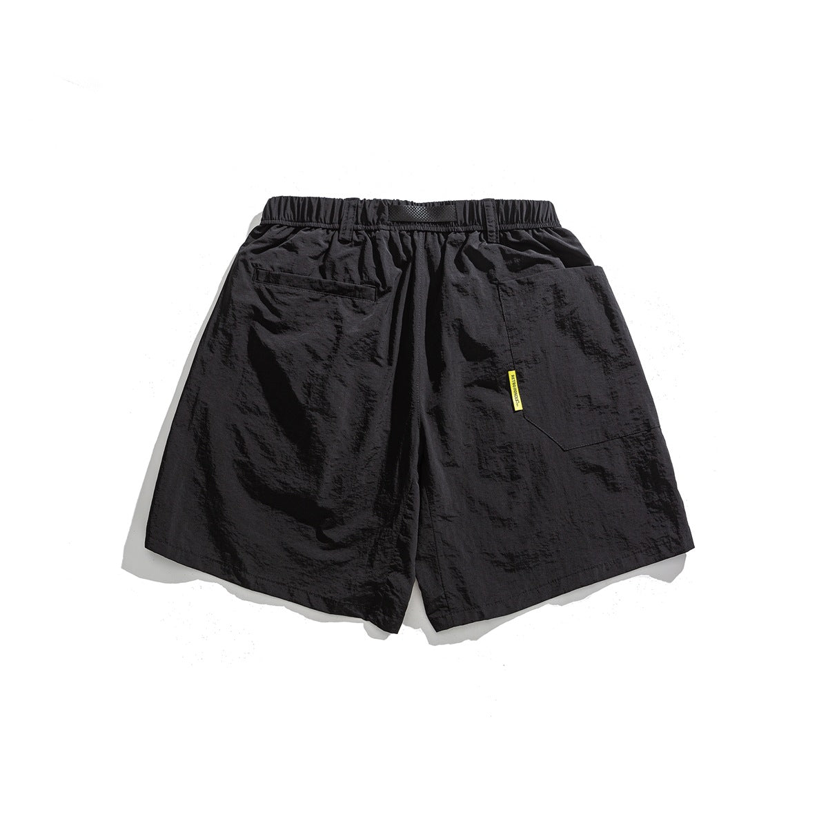 Back view of black shorts with an elastic waistband, belt loops, and two rear pockets.