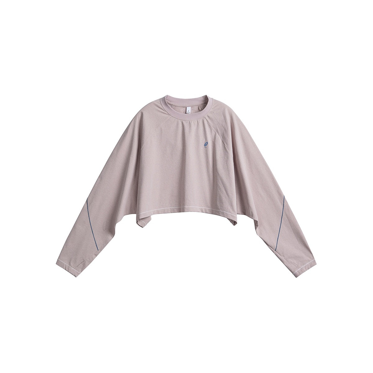 Blush pink cropped long-sleeve top with raglan sleeves, blue sleeve piping and a small chest logo, flat lay front view