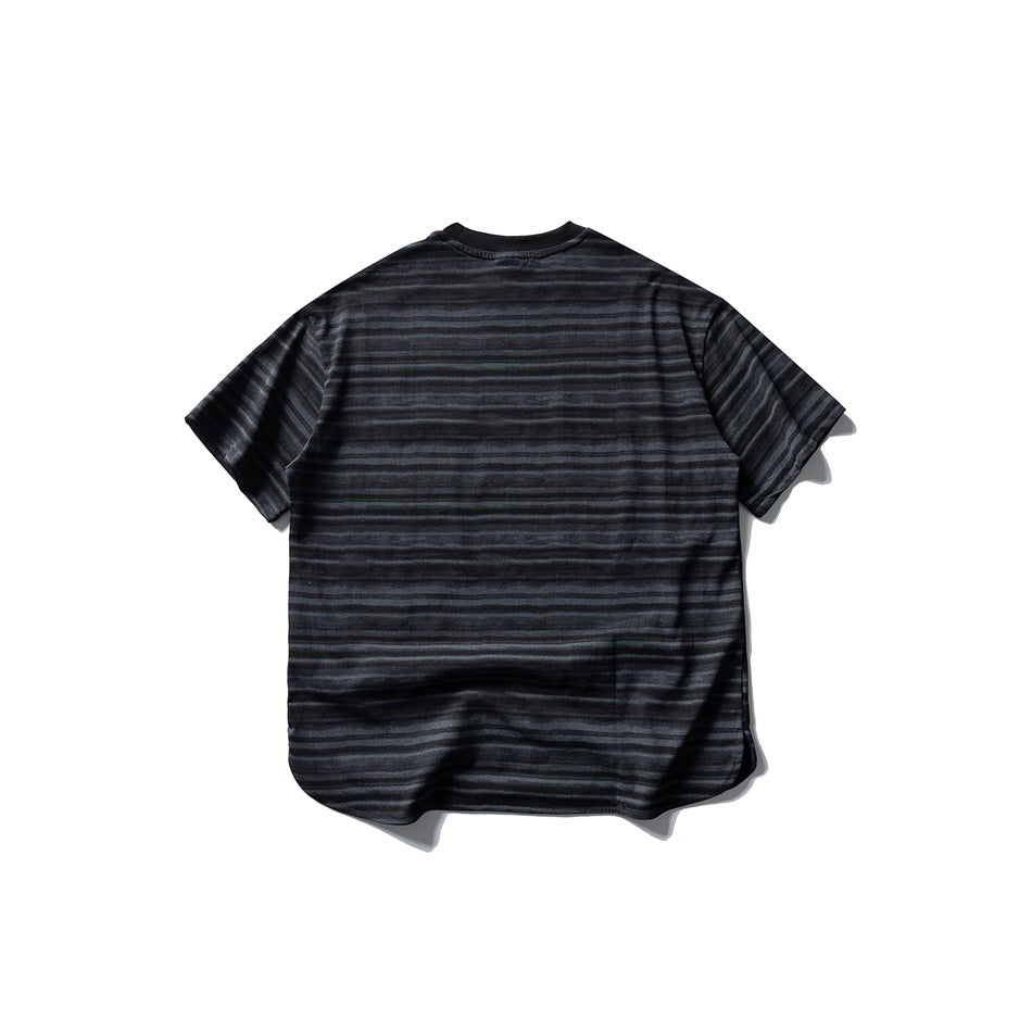 Back view of black striped short-sleeve crew-neck tee with curved hem
