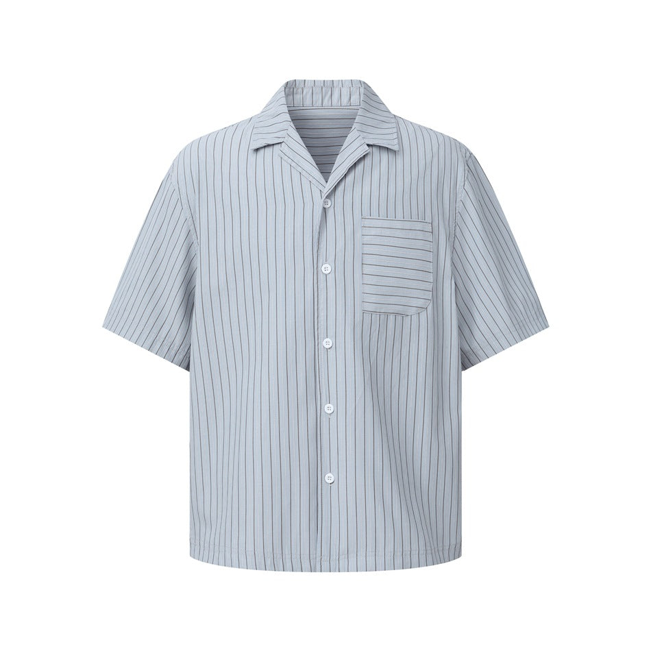 Light blue vertical-striped short-sleeve camp collar shirt with white buttons and chest pocket, front flat view