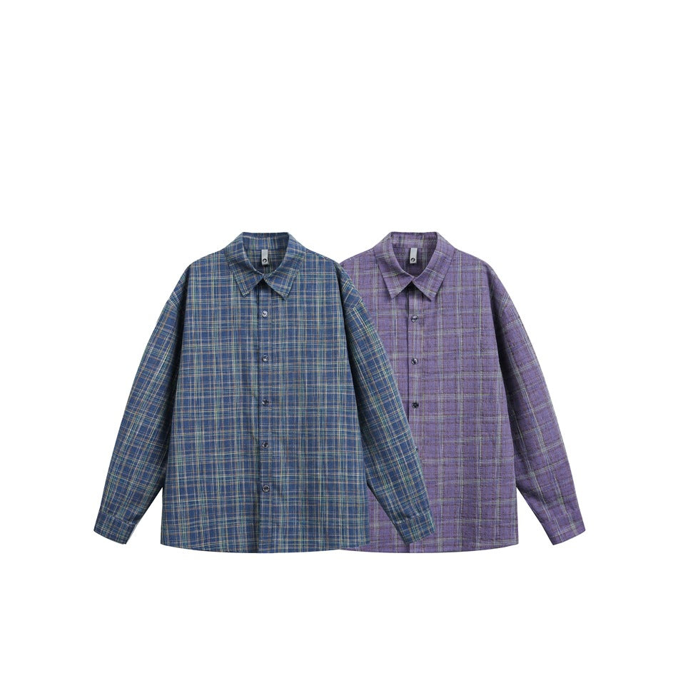 Blue and purple plaid long-sleeve button-up shirts displayed side by side on white background