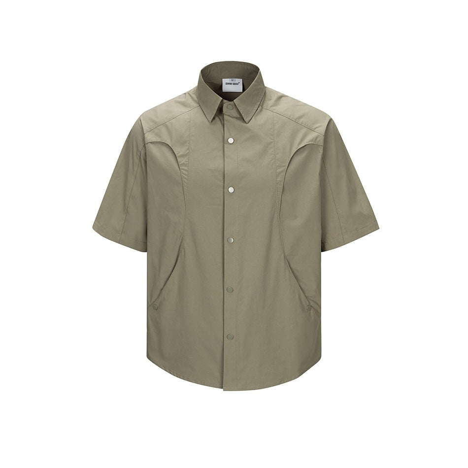 Olive green short-sleeve button-up shirt with curved panel seams and snap buttons, front view