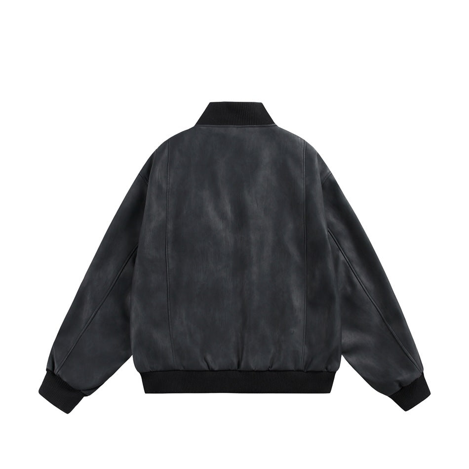 Back view of a black jacket with a ribbed stand collar, cuffs, and hem.