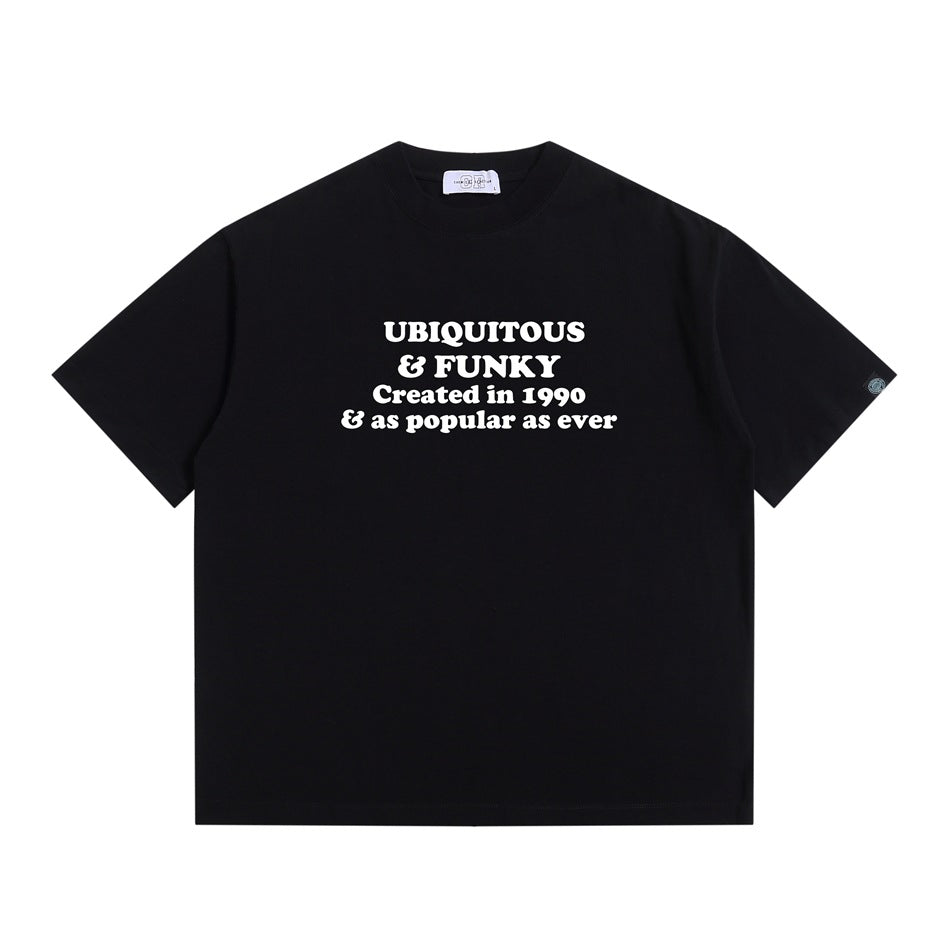 Black short-sleeve T-shirt with white "Ubiquitous & Funky" slogan print on the chest, flat lay