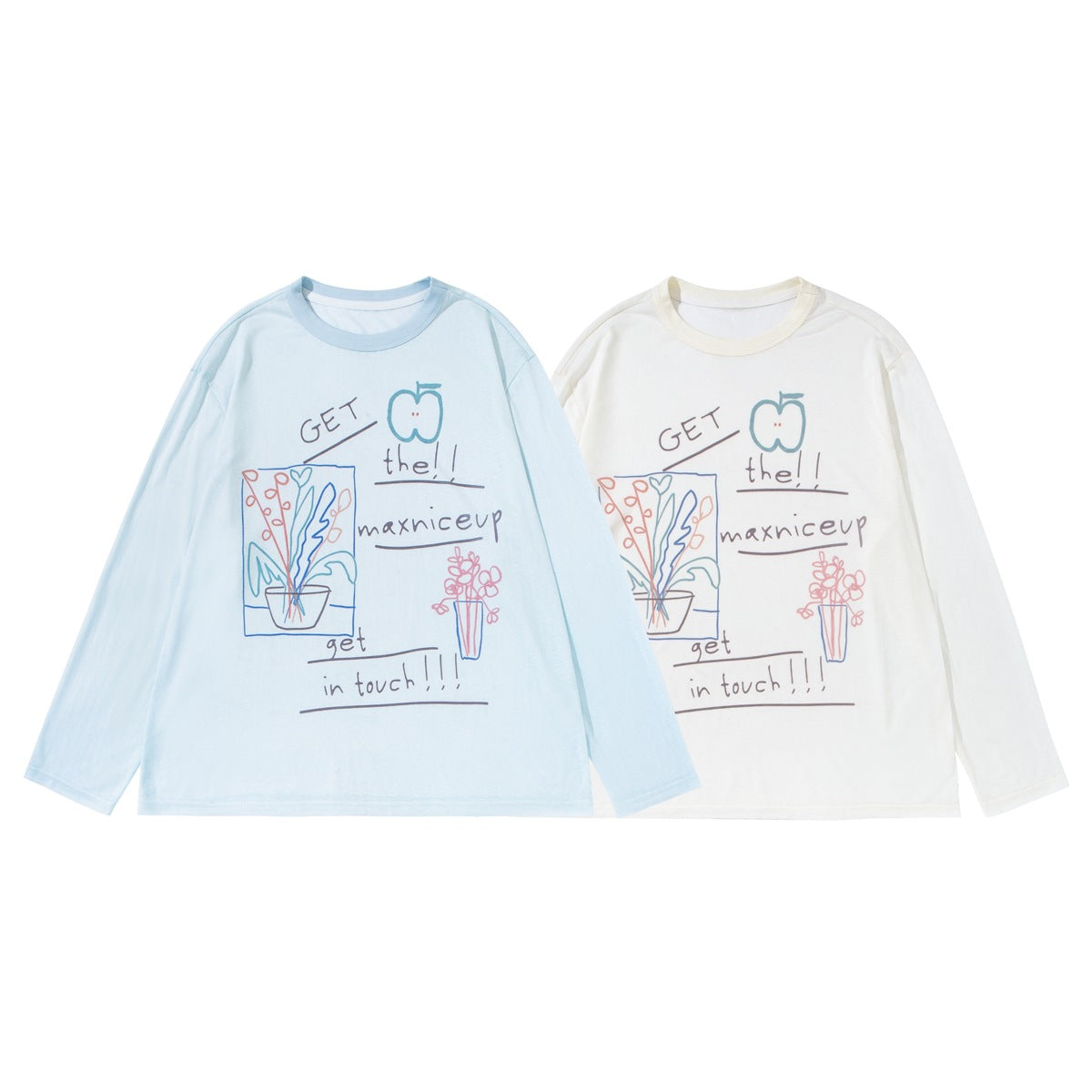 Pale blue and cream long-sleeve crew-neck shirts displayed side by side, each with a colorful hand-drawn graphic.