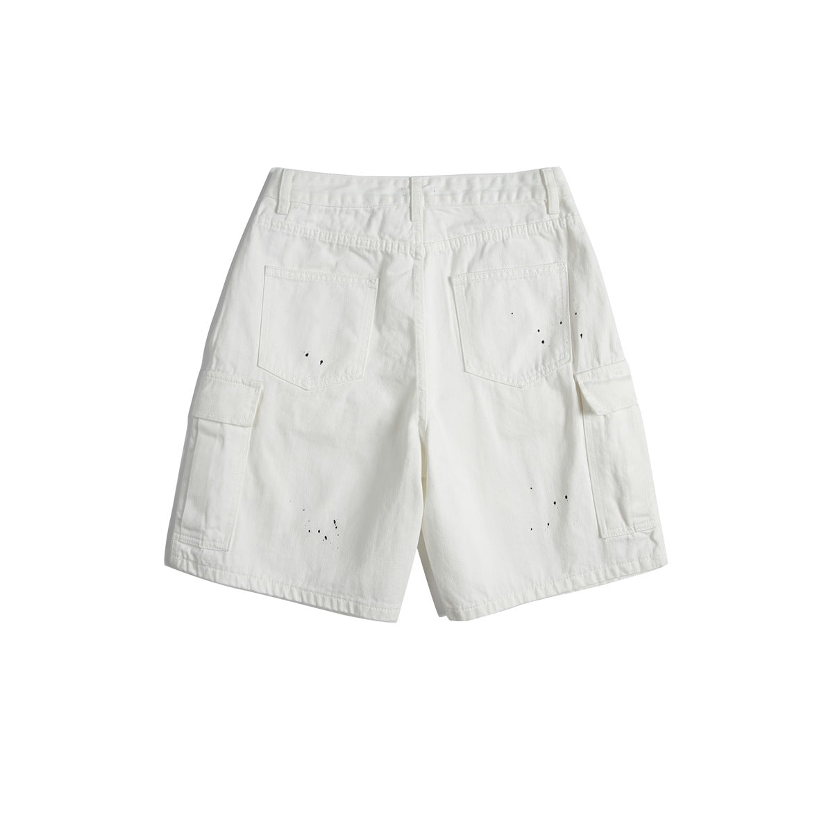 Back view of white cargo shorts with two patch pockets, side flap pockets and black paint splatter marks